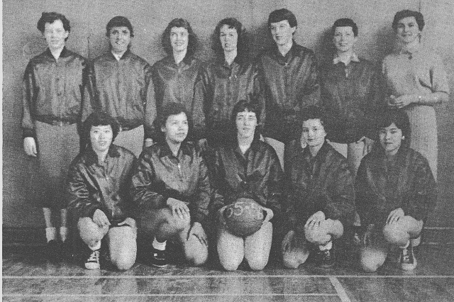 KHS Senior Girls Basketball "Red Angels" 1955-56 - Top Row:- Marilyn Hannah (Mgr), Sheila Mohammed-Ali, Brenda Ward, Helen Emerich, Carol Holt, Pat Tucker, Mrs. Olson (Coach). Front: Row- Tomi Yamada, Susan Gottfriedson, Maureen Schollen, Carol Haines, Sumi Wakabayashi