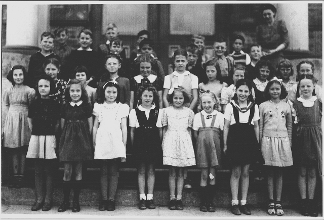 Stuart Wood School, Grade 3, Miss Ross  1945-46 - Top Row-?, Ray Wallace, David Hughes, Gordon West-Johnson, Read English, Miss Ross.  3rd Row-?, Gordon Hayward, ?, Frank Gottfriedson, ?, ?, John Williams.  2nd Row-Jean Nesbitt, Violet Bailey, ?, Marlene Batchelor, ?, Bonita Fiander, Joan Ellis, Wendy Finn, Anne Howie, Jean Murray, Joan Wyse.  1st Row-Sharon Charters, Donna Morse, Marilyn McLellan, Jean Laviolette, Margaret Ferrier, Elna Weberg, Linda Gough, Flora McKnight, Wilma Stinson