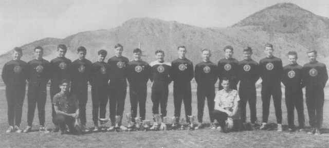 KHS Boys Track Team, Spring 1955 - Back Row:- Dick Chrobach, Grant Handford, Ben Moyer, Laurie Hannis, Maurice Shepherd, Harold Black, Duncan Campbell, Jin Feke (Coach) Don Trethewey, Paul Tennant, Bev Burns, Sandy McKay, Bill Martin, Merve Oulette, Steve Atamanchuk.  Kneeling:- Bill Richmond, Alan Cole Team Managers