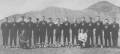 KHS Boys Track Team, Spring 1955 - Back Row:- Dick Chrobach, Grant Handford, Ben Moyer, Laurie Hannis, Maurice Shepherd, Harold Black, Duncan Campbell, Jin Feke (Coach) Don Trethewey, Paul Tennant, Bev Burns, Sandy McKay, Bill Martin, Merve Oulette, Steve Atamanchuk.  Kneeling:- Bill Richmond, Alan Cole Team Managers :: Click photo for larger view