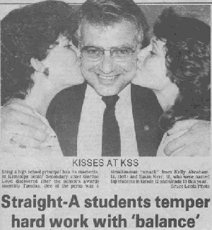 Gordon Lloyd receives his own 'award' from top grade 12 student Kelly Abraham and top grade 11 student Susan Kerr - 1984
