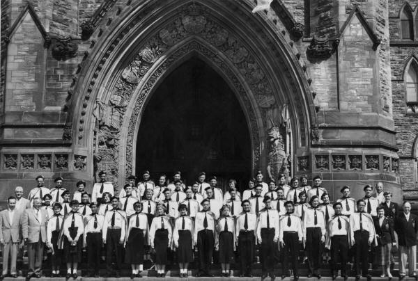 Posed photo of band members at the Parliament buildings